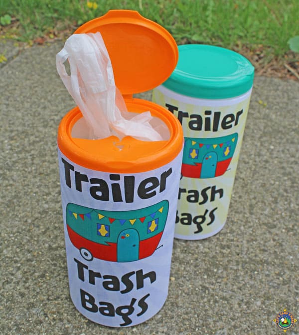 containers filled with trash bags for camping