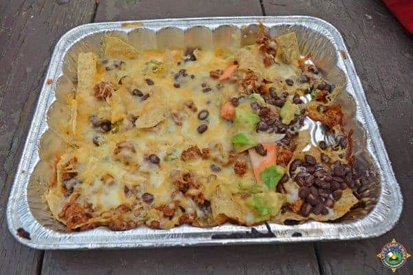 grilled nachos in a foil pan