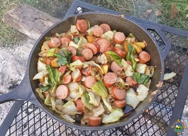 https://letscampsmore.com/wp-content/uploads/2017/04/kielbasa-skillet-over-the-campfire.jpg.webp