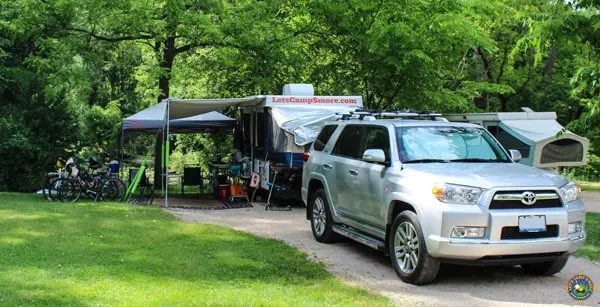 campsite with a popup trailer and a Toyota 4Runner