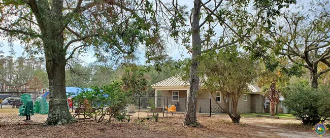 the bathroom and playground at Dauphin Island RV Park