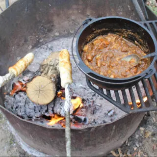 Canned Stew and Campfire Rolls made over a Campfire