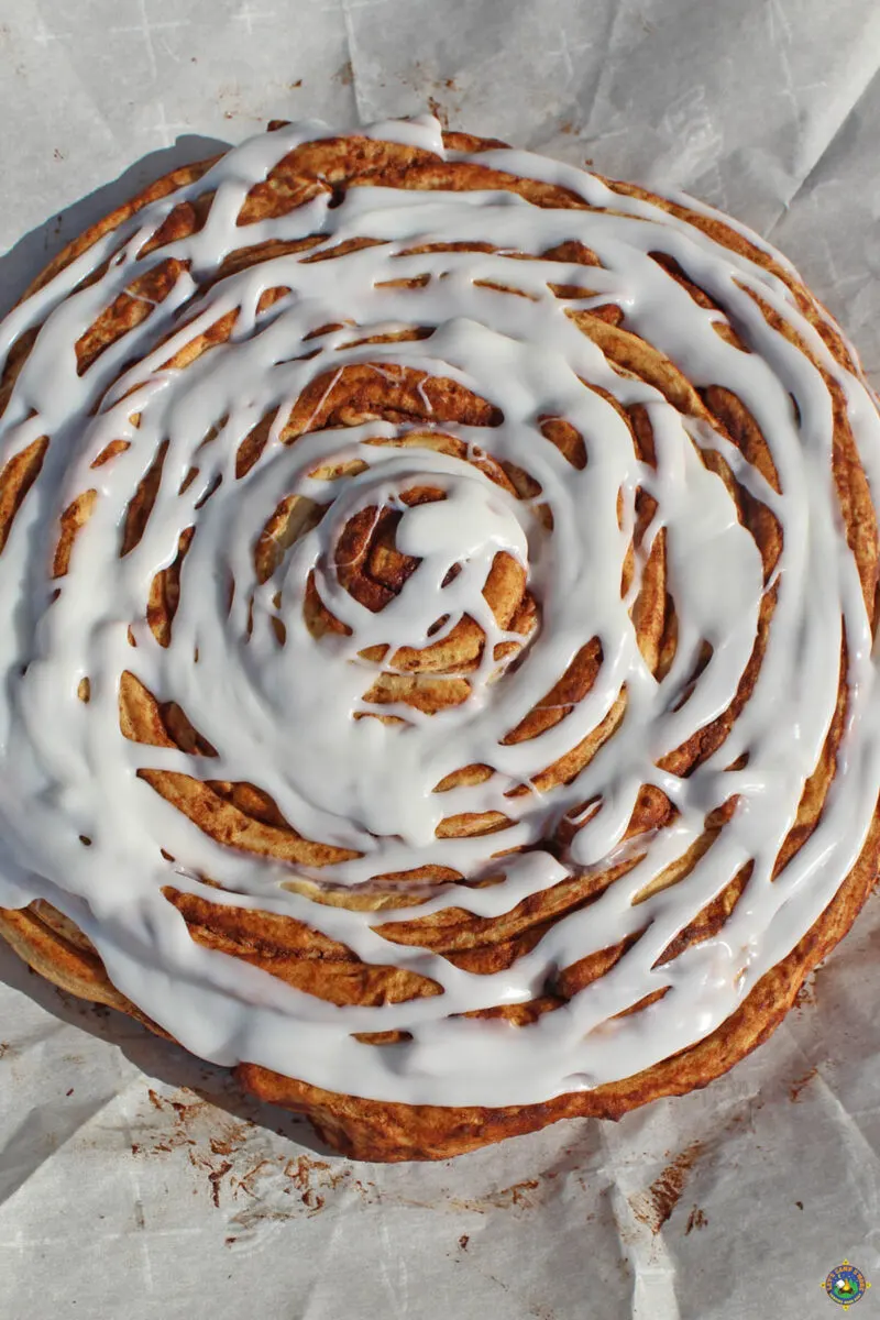 large cinnamon roll with icing