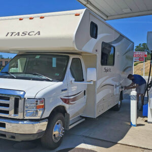 motorhome being filled at a gas station