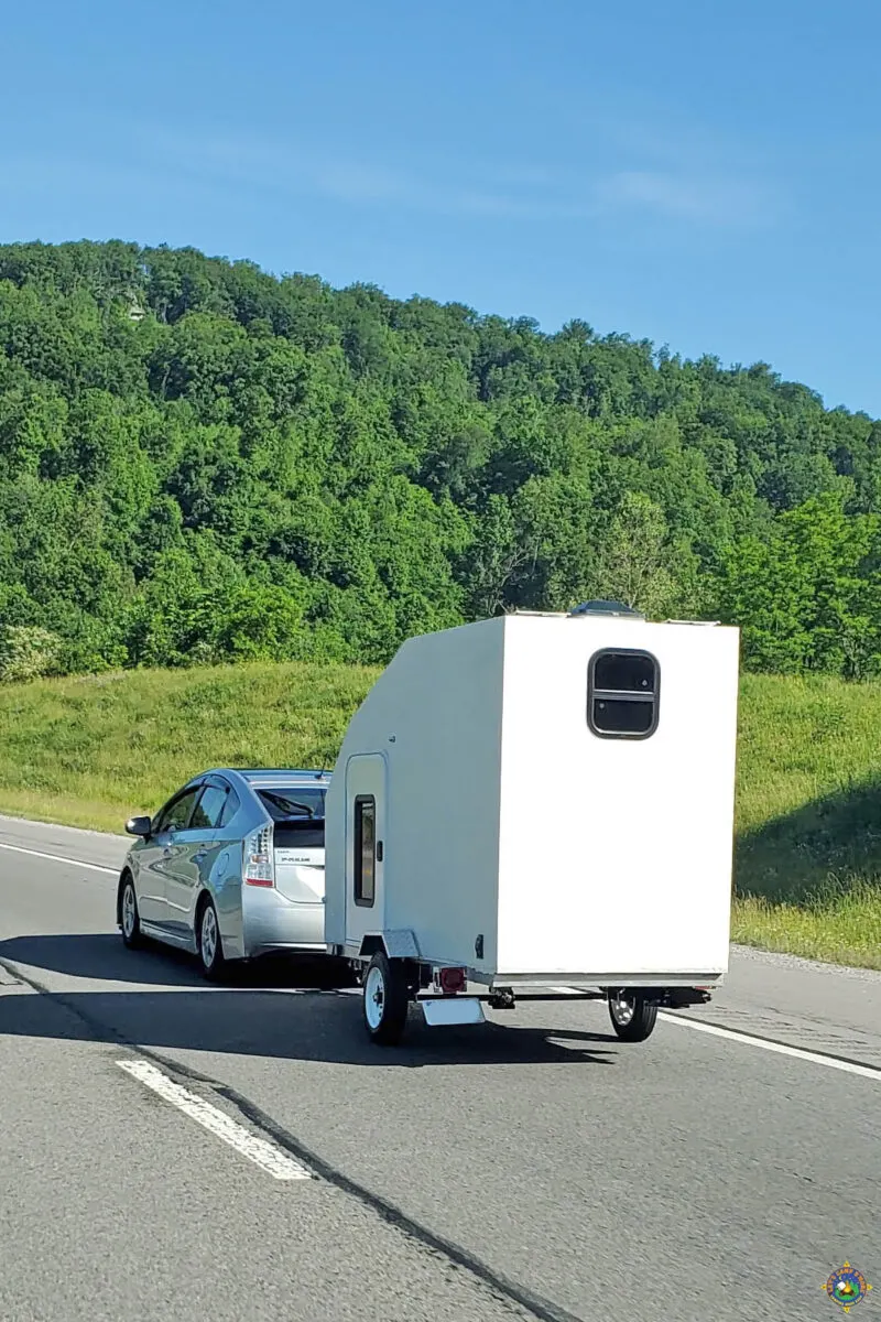 Prius towing a small Camper