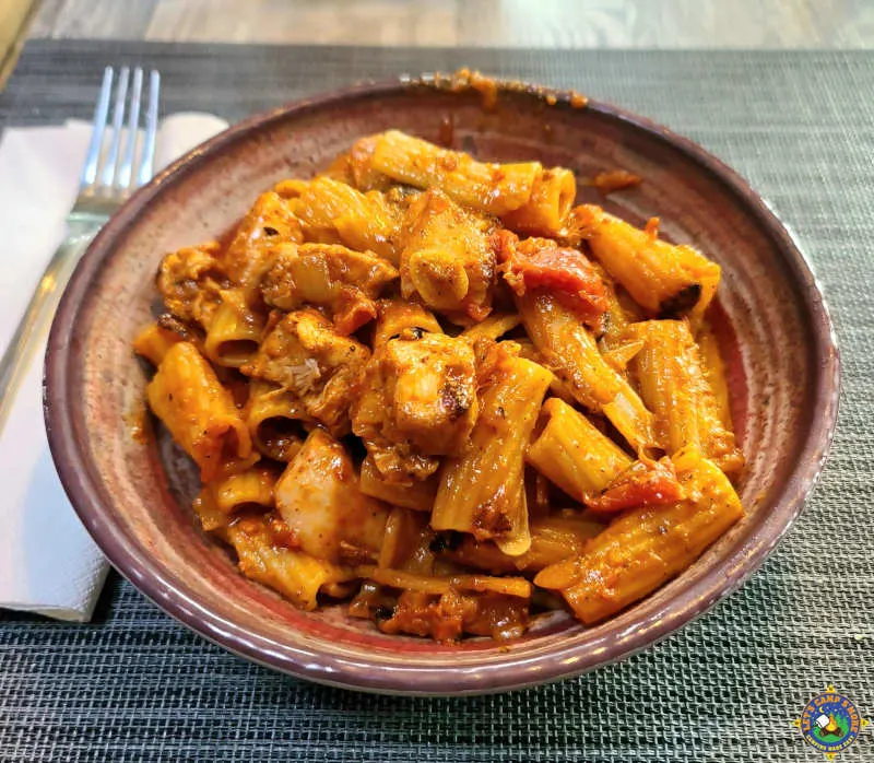 dutch oven chicken and pasta on a plate