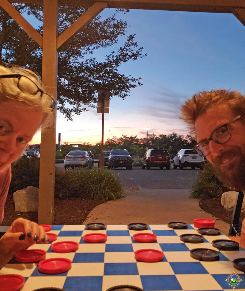 couple playing checkers on the porch at Cracker Barrel