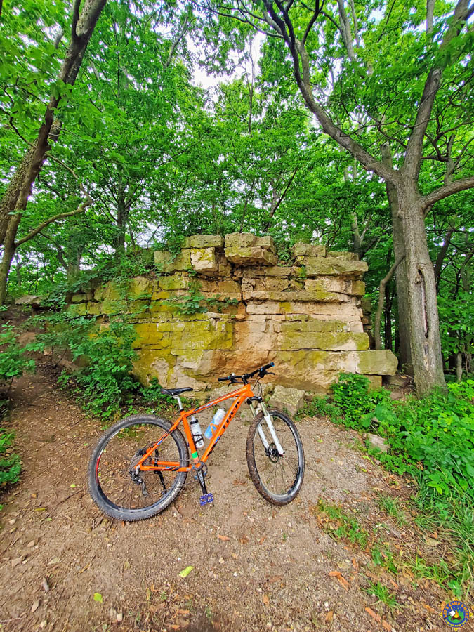 bike in front of a cliff