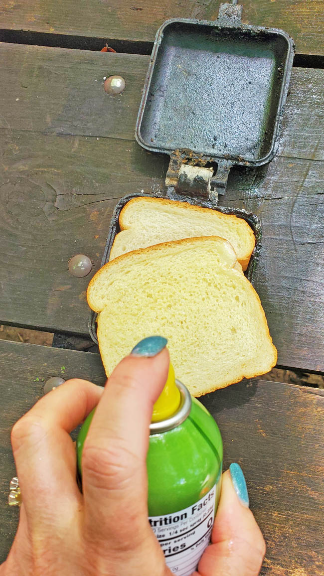 Spray Butter on bread for a Camping Sandwich Maker