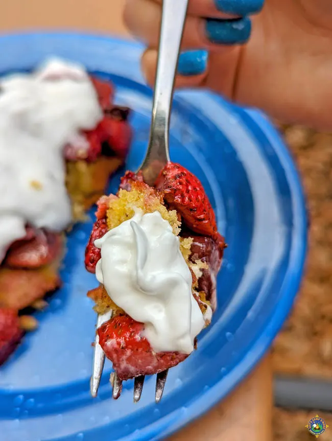 Strawberries Cake and Whipped Topping Dessert on a Fork