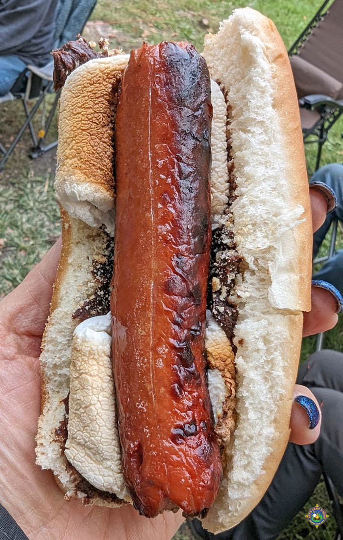 woman holding a Camping S'more Dog